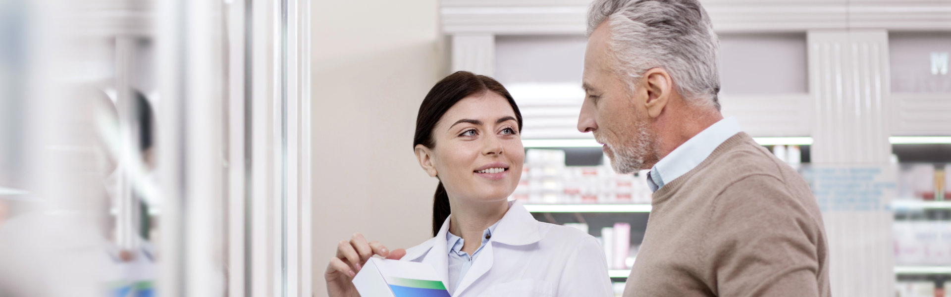 pharmacist and elder man