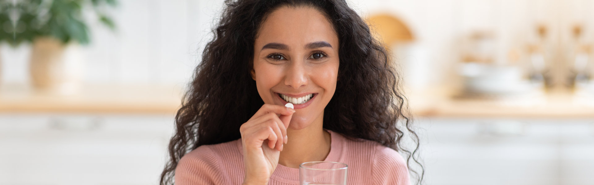 woman taking vitamins
