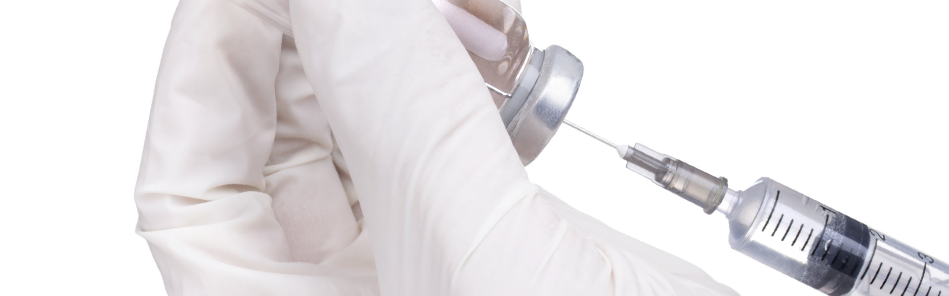 hand holding syringe